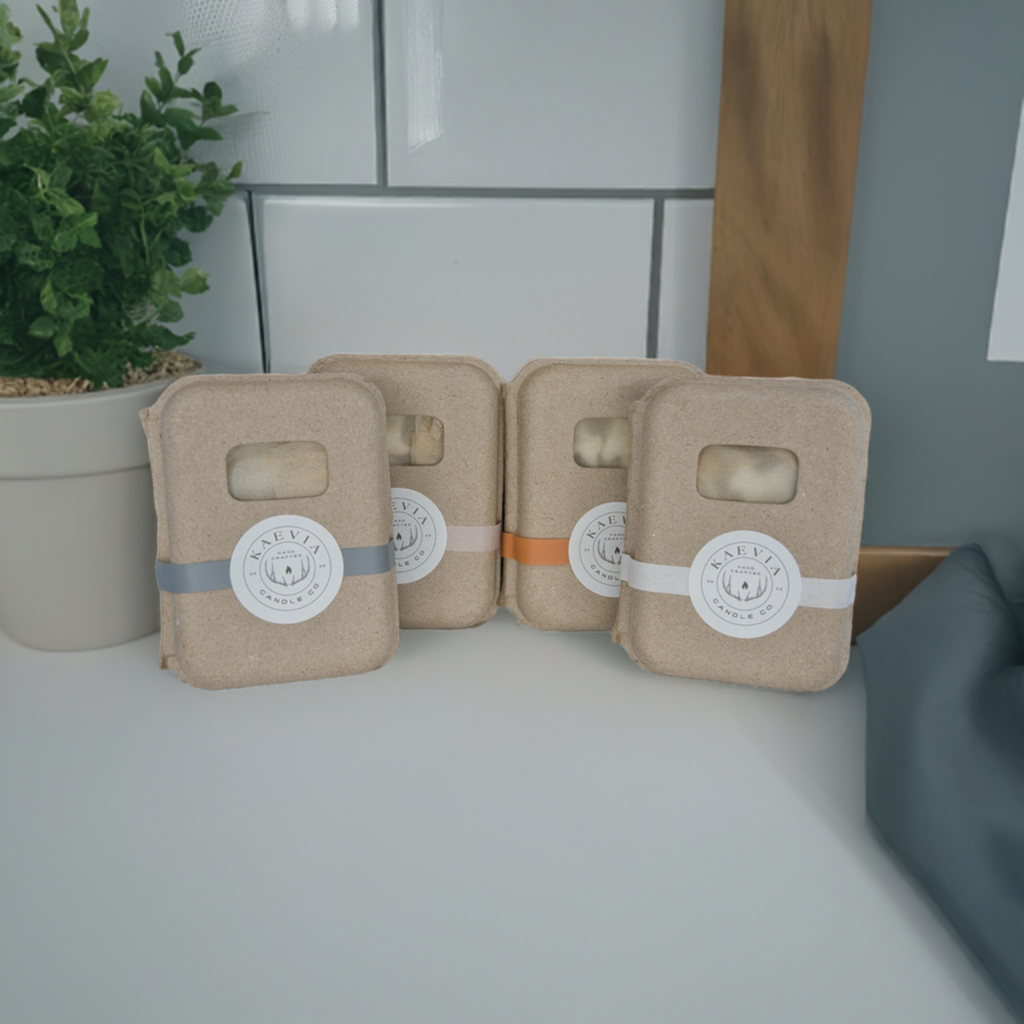 A pack of four Eco Melts lined up next to each other and backing a kitchen backsplash