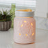 Home sweet home white warmer with melts sit on a white kitchen counter