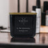 Kaevia Red Stag Trophy candle in a minimalist black jar.
