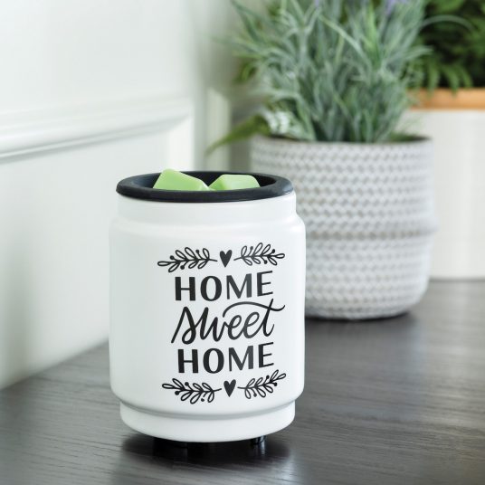green melts sit on black warmer tray on table